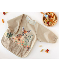 BABERO IMPERMEABLE CON MANGAS CIERVO BEIGE-KIOKIDS